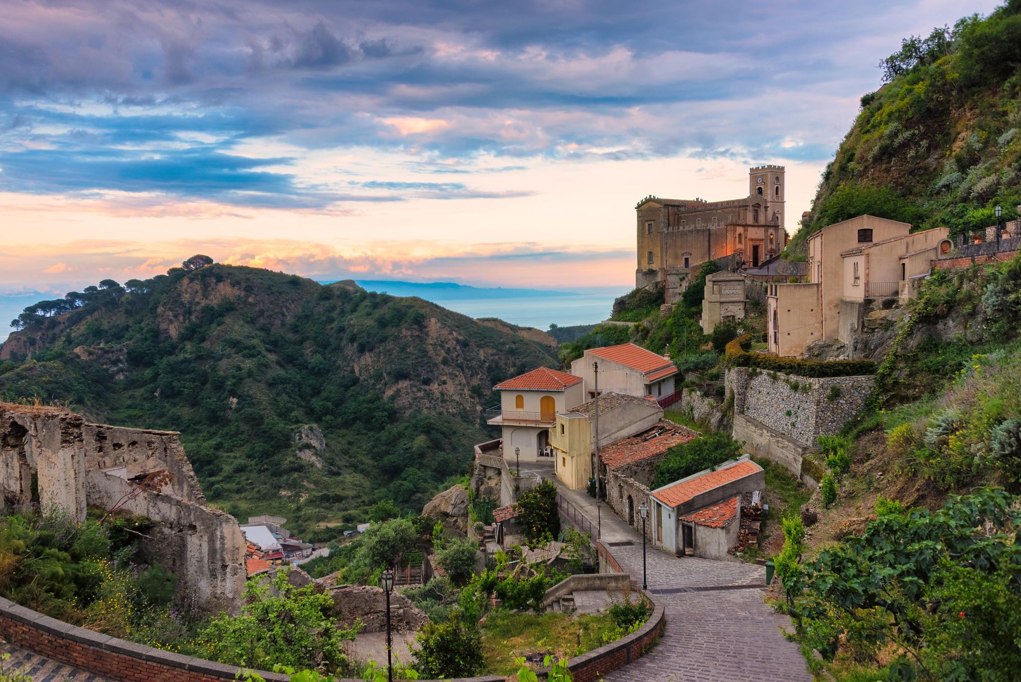 The Church of St. Nicolò at sunset, Savoca, Italy. Savoca was the location for some scenes of The Godfather movie. Photo: Getty